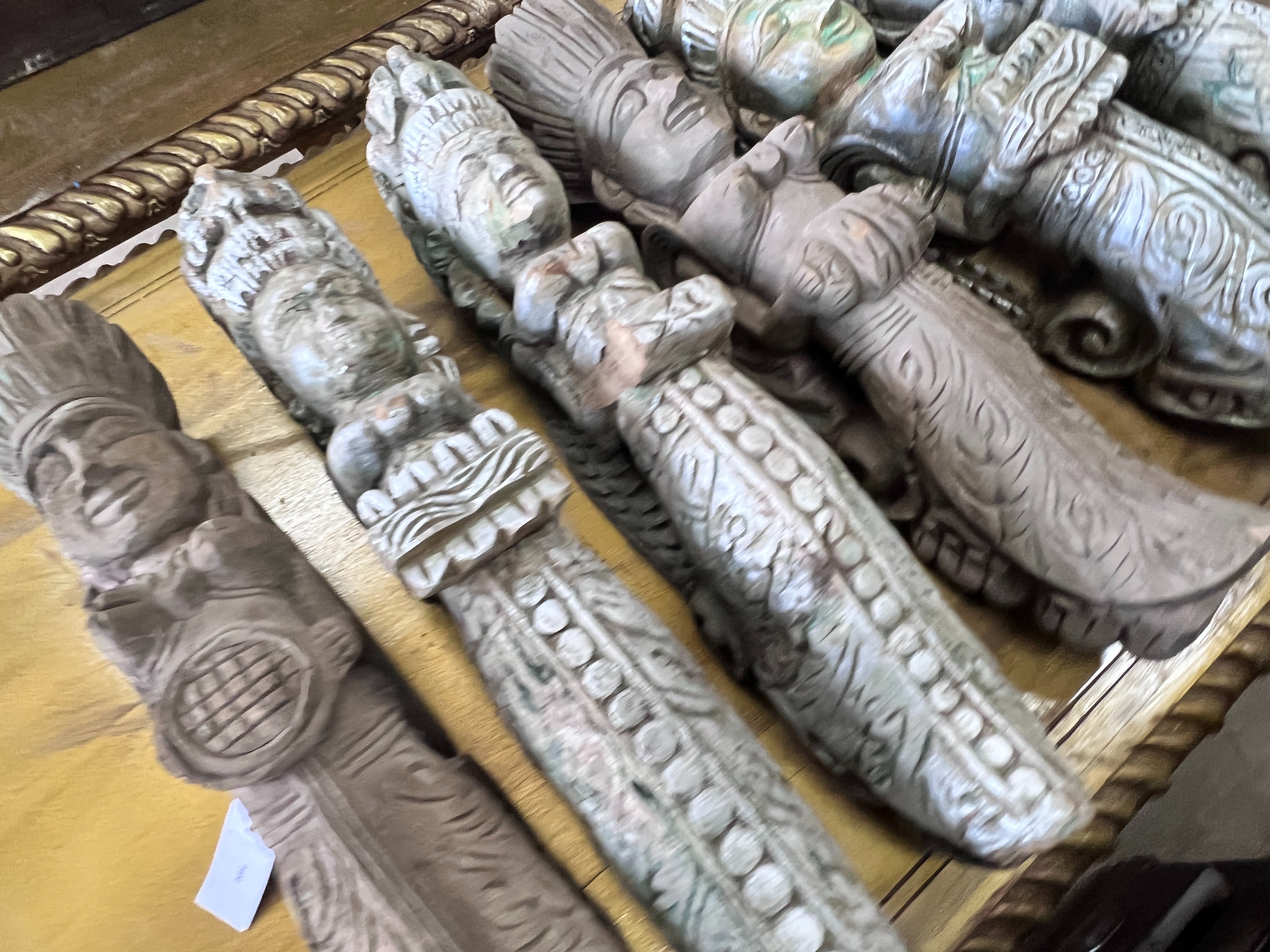 A set of six Indonesian carved hardwood figural appliques, height 60cm